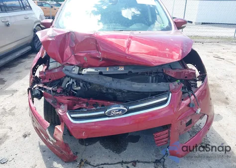 2014 Ford Escape Titanium z USA, uszkodzony, nr VIN 1FMCU9J98EUB95425